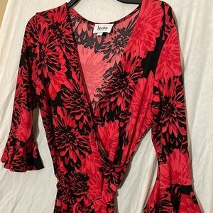 Bold pattern faux wrap dress with 3/4 length bell sleeves